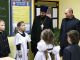 Путин, священник и дети. Фото: yodnews.ru