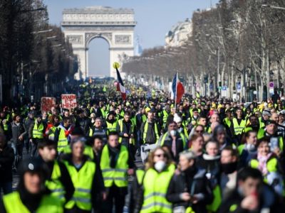 Демонстрация "желтых жилетов" на Елисейских полях, 16 февраля 2019 года, в Париже. Фото: AFP / Eric FEFERBERG